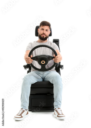 Handsome man with steering ...