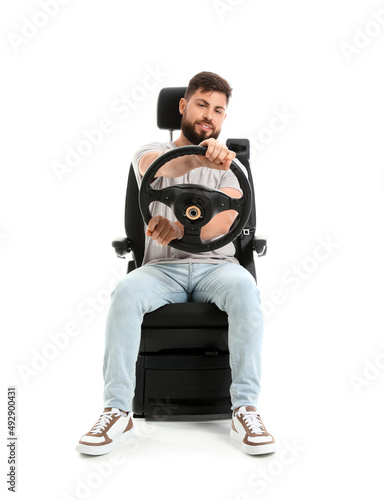 Handsome man with steering ...
