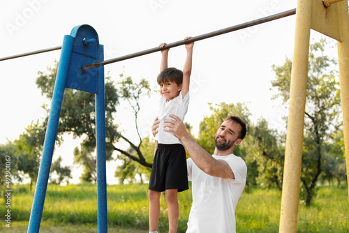 Little boy with his father ...