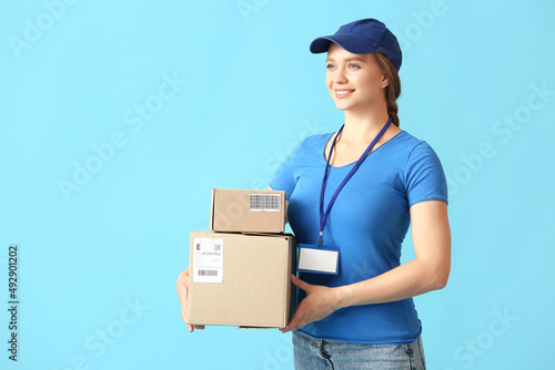 Female courier with parcels...
