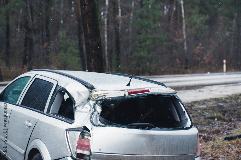 Ruins of family friendly suv big car laying on highway Poland. High quality photo Ruins of family friendly suv big car laying on highway Poland. High quality photo