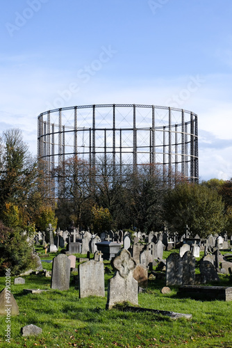Kensal Green Cemetery and Gasholder in the background, London, UK photo