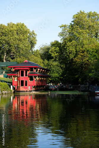 Floating red pagoda restaurant on the canal, London, UK