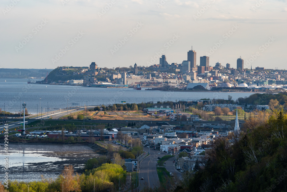 The St Lawrence river and the city of Quebec, it's old district and its harbor with the beauport district in the foreground, view since the Montmorency falls national park of the SEPAQ