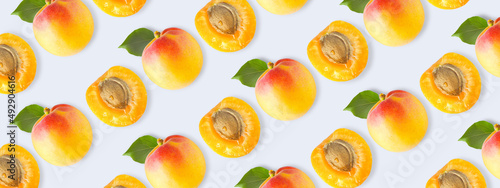 Fototapeta Naklejka Na Ścianę i Meble -  Repeating apricots pattern on a light background