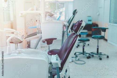Selective focus on modern chairs in Dentist s office
