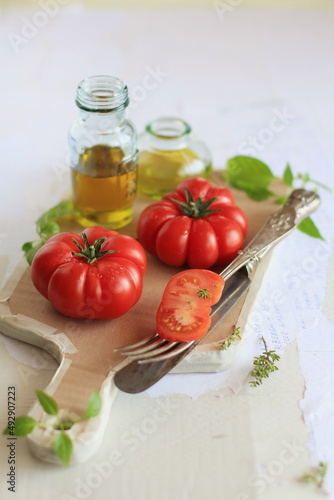 Tomatoes and olive oil, Sicilian food, italian eating, concept of healthy eating, healthy food, mediterranean diet.