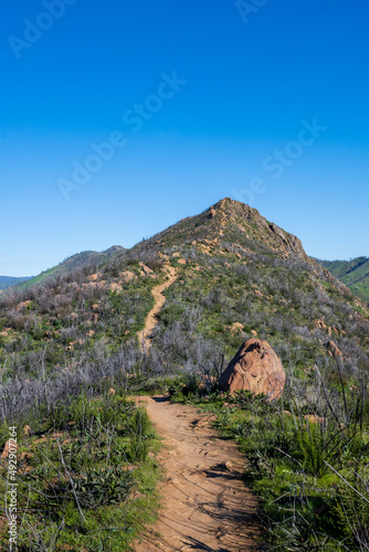 The winding path he Blue Ridge trail at the Stebbins Cold Canyon in California, featuring mountains and peaks, 2022