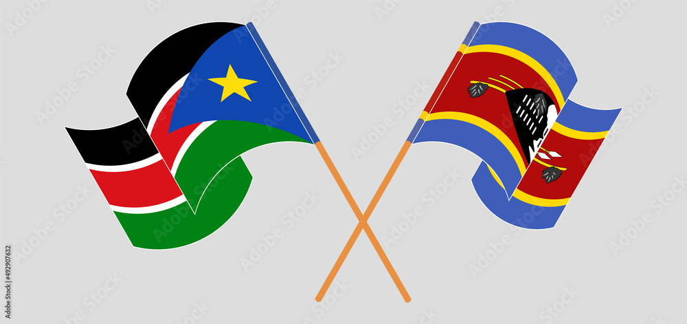 Crossed and waving flags of South Sudan and Eswatini