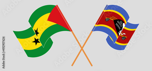 Crossed and waving flags of Sao Tome and Principe and Eswatini