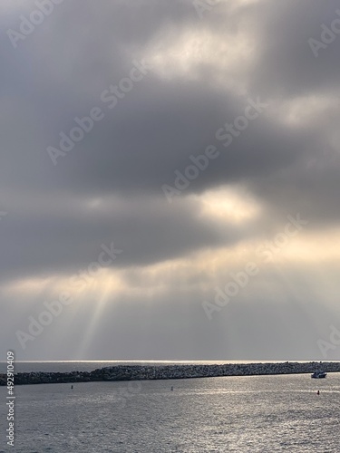 Clouds and rays of sun over the sea