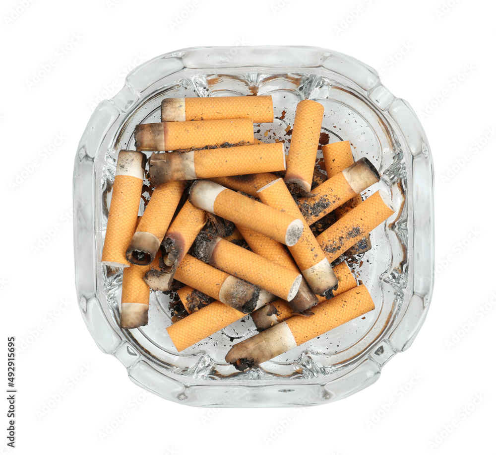 Glass ashtray full of cigarette stubs isolated on white, top view Glass ashtray full of cigarette stubs isolated on white, top view