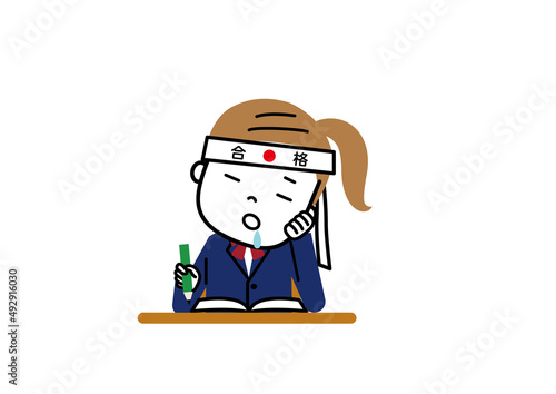 勉強中よだれを垂らして居眠りしている女子学生