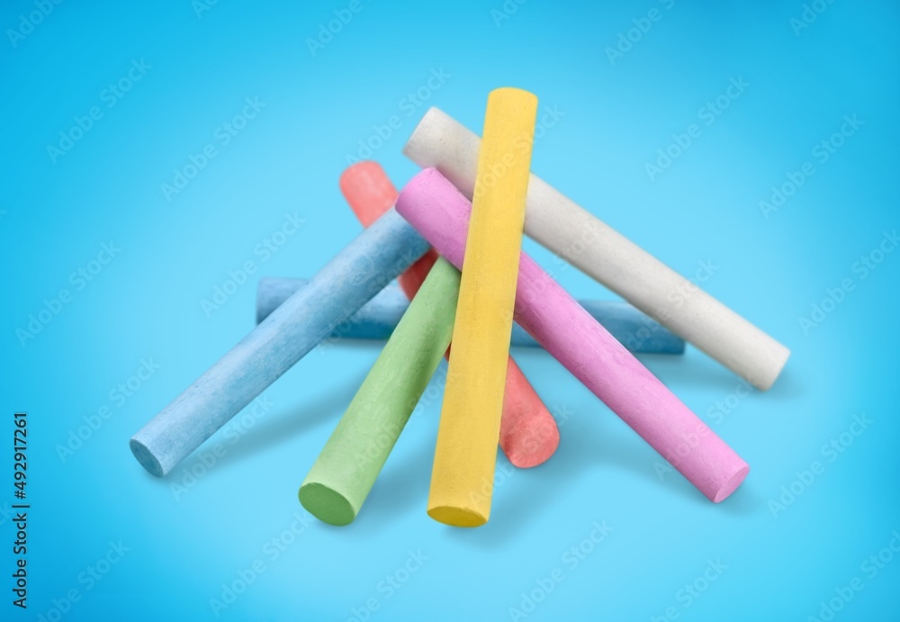 Stack of colored chalk on background Stack of colored chalk on background