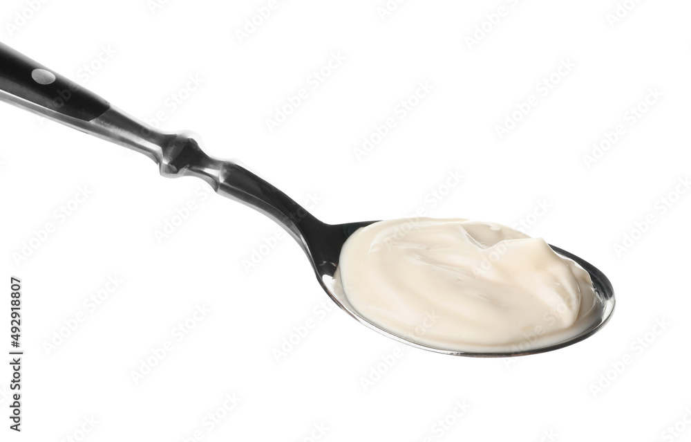 Spoon with tasty mayonnaise isolated on white Spoon with tasty mayonnaise isolated on white