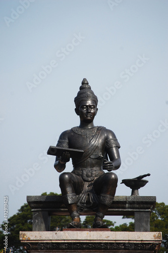 Monument Pho Khun Ram Khamhaeng Maharat statue for travelers thai and foreign people travel visit respect praying at Si Satchanalai Historical Park Unesco World Heritage Site in Sukhothai, Thailand