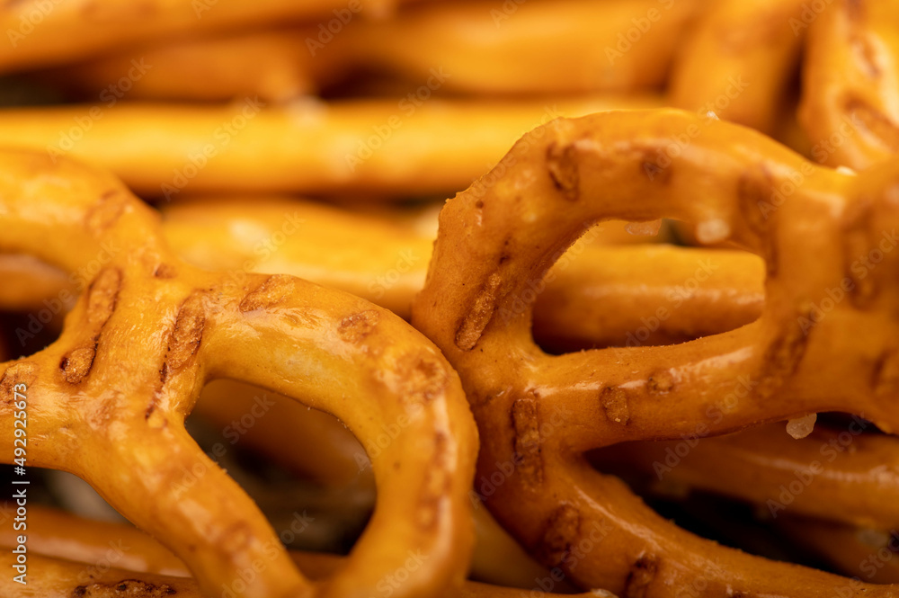 Crispy bread straws with salt, close-up, selective focus, top view. Crispy bread straws with salt, close-up, selective focus, top view.