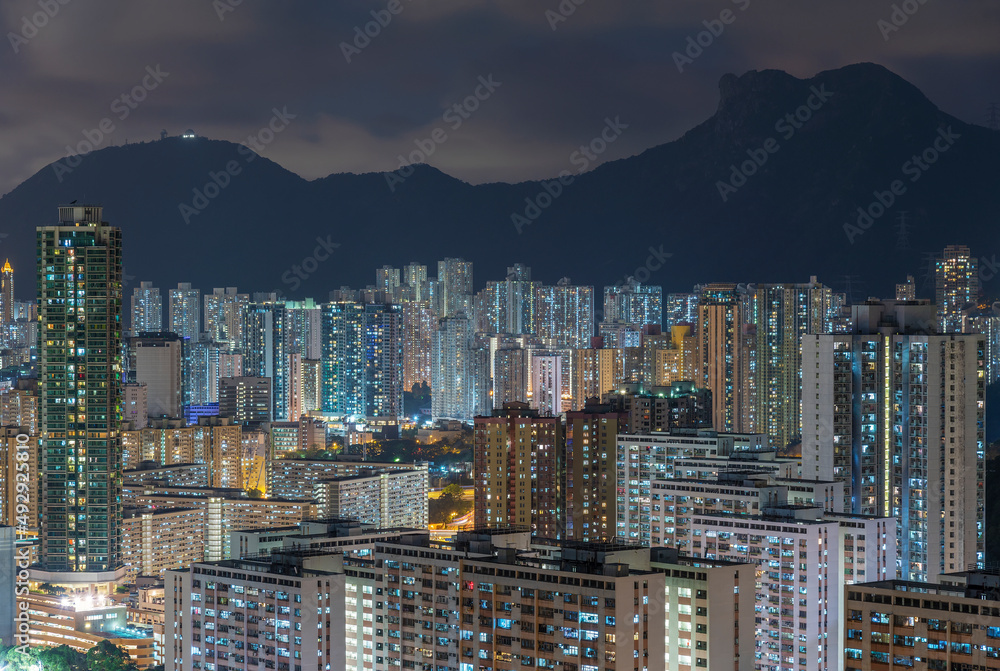 Night scenery of mountain Lion Rock and skyline of Hong Kong city
