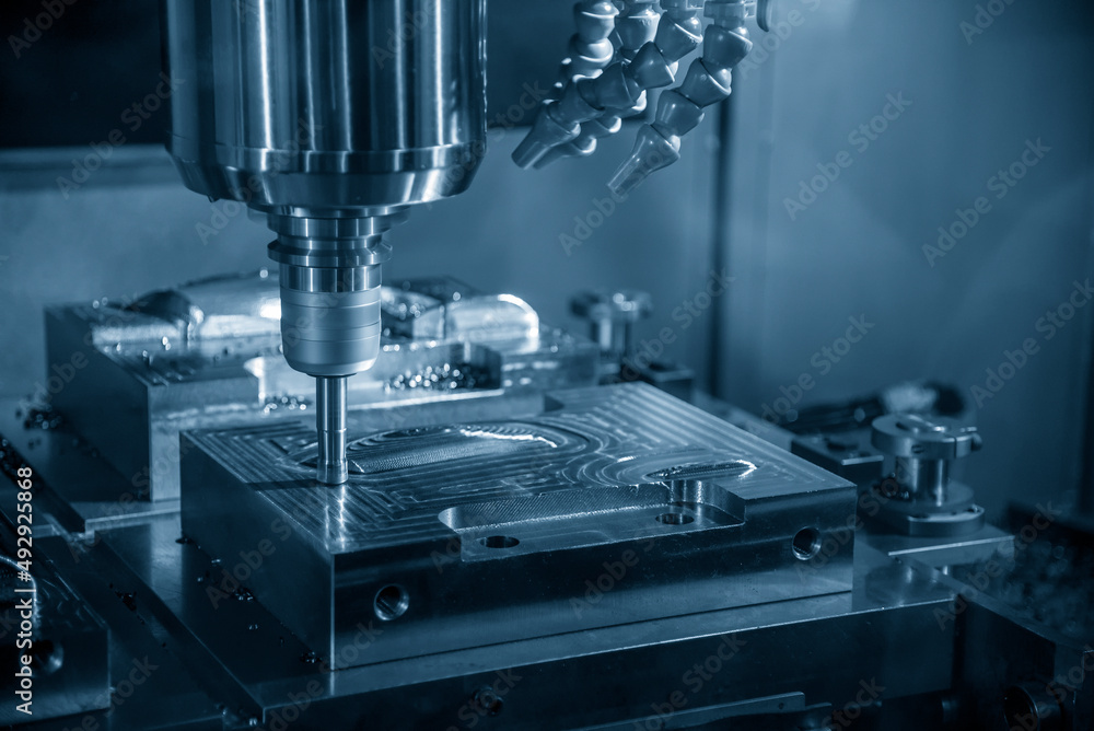 The CNC milling machine rough cutting the injection mold parts by indexable endmill tools. The CNC milling machine rough cutting the injection mold parts by indexable endmill tools.