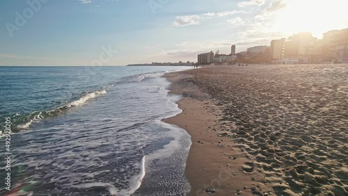 Moving forward at the beach coastline of Benalmadena, south of Spain photo