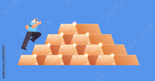 arabic businessman working on financial money platform investor analyst running over bars pile invest in stock market