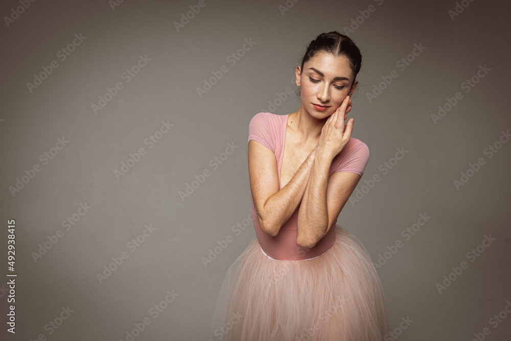 portrait of a young pretty, fragile, beautiful ballerina in a long