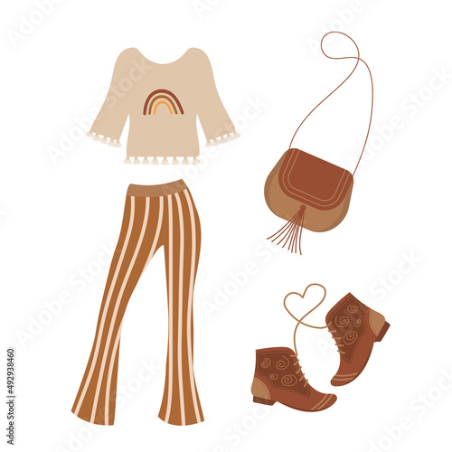 Boho outfit. Striped flared trousers, rainbow blouse, fringed bag and leather boots.
