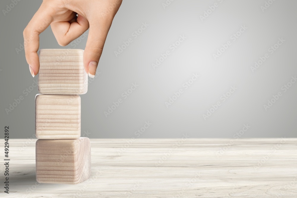 Hand hold wood cube with symbol Business concept. Instructions to ...