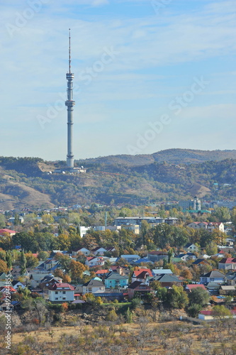Almaty, Kazakhstan - 10.19.2012 : Residential buildings and commercial buildings located in the city center at the foot of the mountains.