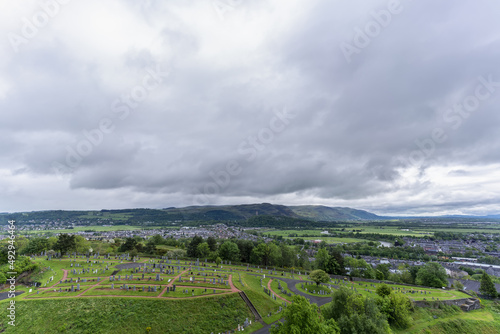 Scenery from Stirling Castle viewing Old Town Cemetery and The National Wallace Monument very far away in Stirling , Scotland