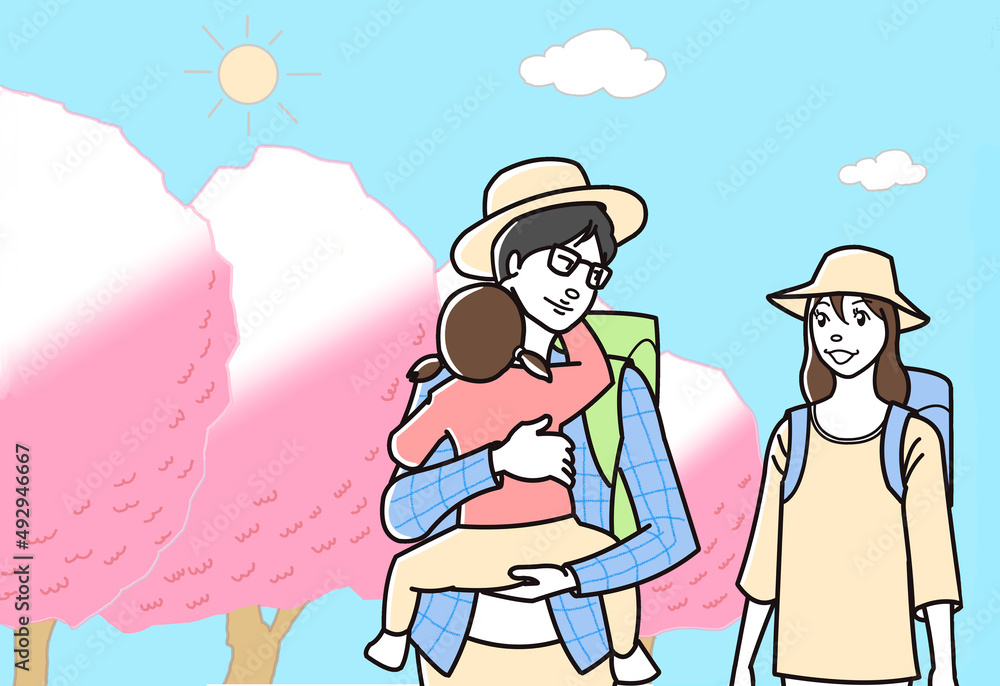 Fototapeta premium 子供を抱いて桜の下をトレッキングする夫婦