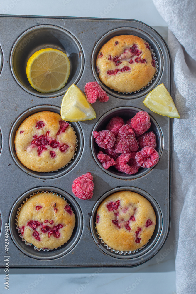 sweet vanilla raspberry muffins on a table sweet vanilla raspberry muffins on a table