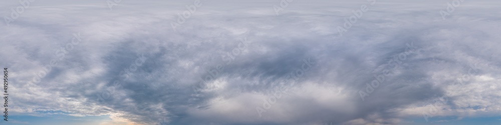 Overcast sky panorama on sunset with Cumulus clouds in Seamless spherical equirectangular format as full zenith for use in 3D graphics, game and aerial drone 360 degree panoramas for sky replacement. Overcast sky panorama on sunset with Cumulus clouds in Seamless spherical equirectangular format as full zenith for use in 3D graphics, game and aerial drone 360 degree panoramas for sky replacement.