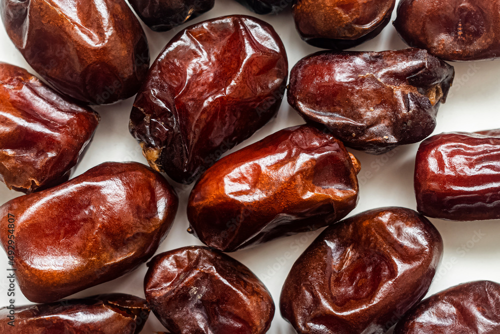 Background image of dried dates in close-up Background image of dried dates in close-up