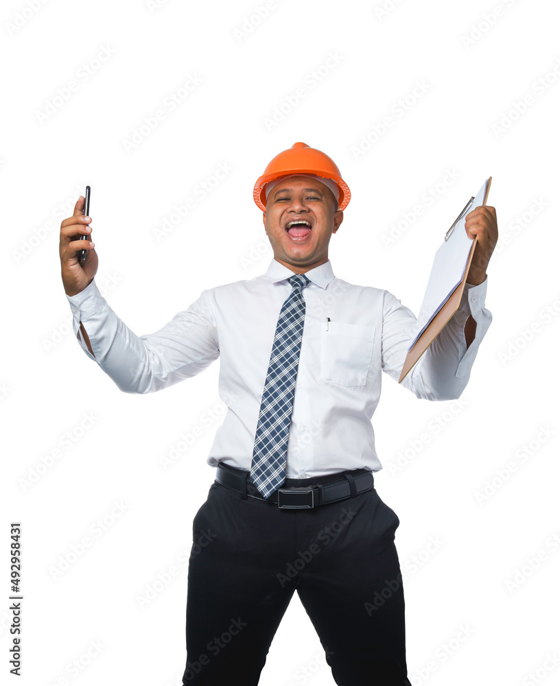 Young engineer or architect standing with clipboard and fist gesturing very happy and smiling happy isolated on white background with clipping path