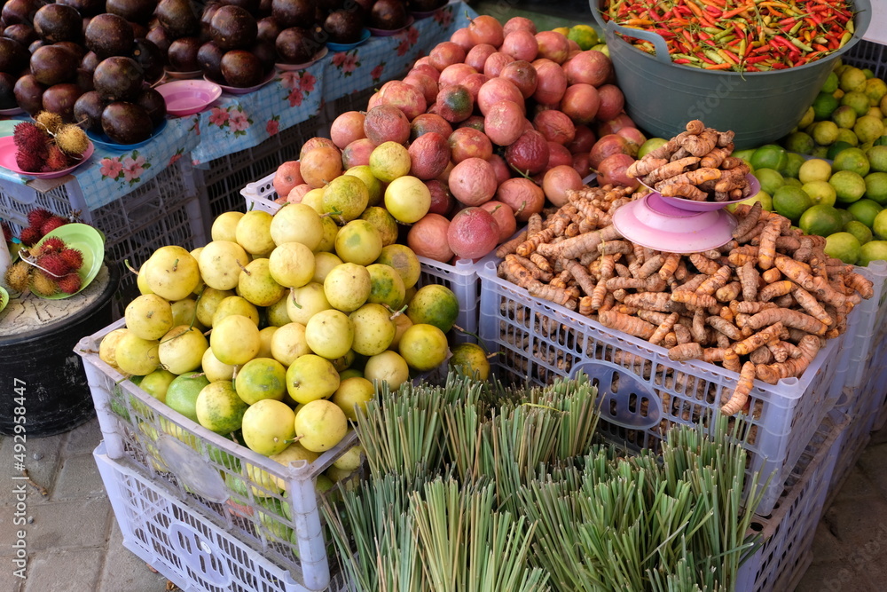 Fresh colourful fruit and vegetables on a stall at the local food market in capital Dili, Timor Leste, Southeast Asia Fresh colourful fruit and vegetables on a stall at the local food market in capital Dili, Timor Leste, Southeast Asia