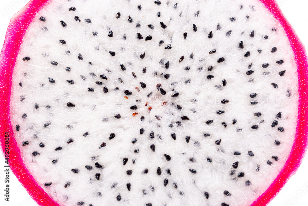 Obraz premium beautiful fresh sliced white dragon fruit as background, Dragon fruit. Close-up view of the fruit details