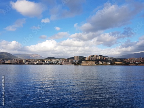 Panorama of the Corsican city of Bastia and the cloudy sky from the sea in March 2019 © Anatolijs