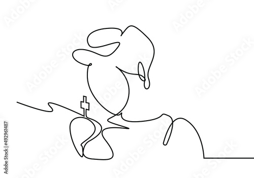 a praying person clasping hands