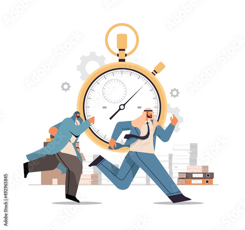 overworked arab businessmen with stopwatch running in office hurry at work deadline time management concept