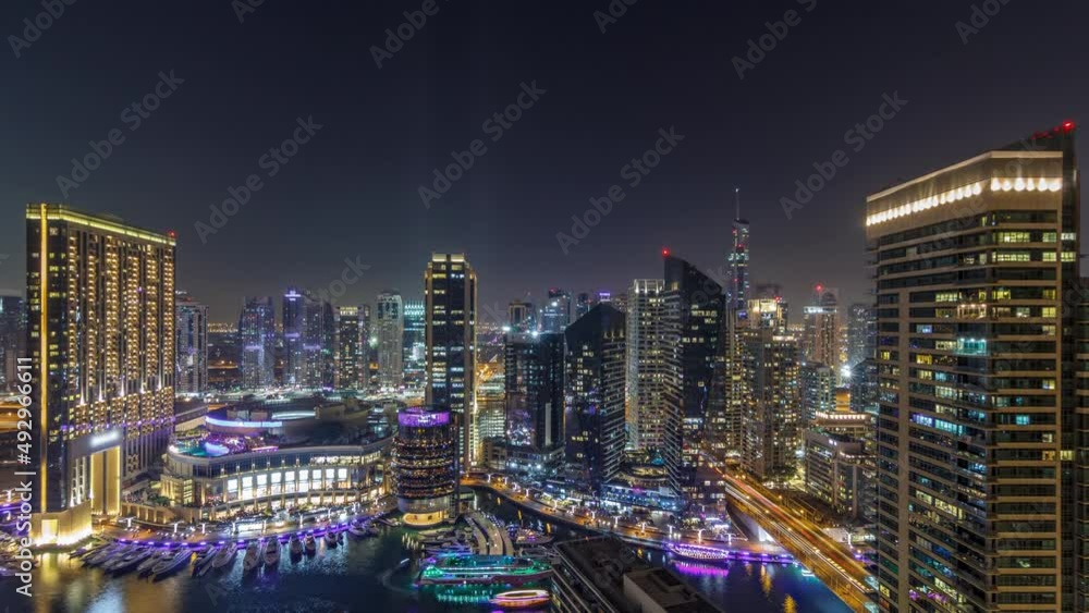 Night illumination of Dubai Marina aerial timelapse, UAE. Night illumination of Dubai Marina aerial timelapse, UAE.