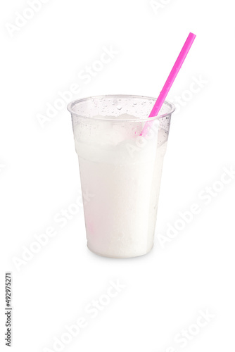 Sicilian granita with Sorrento lemon with straw and transparent glass on a white background