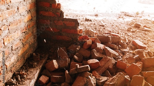 Fotografija Close-up of the rubble of an industrial building collapsing into a pile of concrete and brick