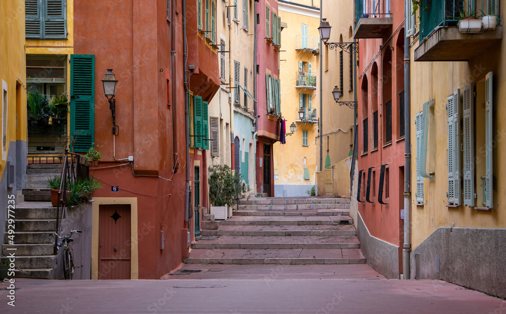 Fototapeta premium The colorful houses of the people of Nice, France, on a very nice and narrow street