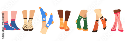 Pairs of feet in socks set. Vector illustrations of female and male underwear. Cartoon warm wool or cotton clothes for legs with funny pattern isolated on white. Accessory, footwear, fashion concept