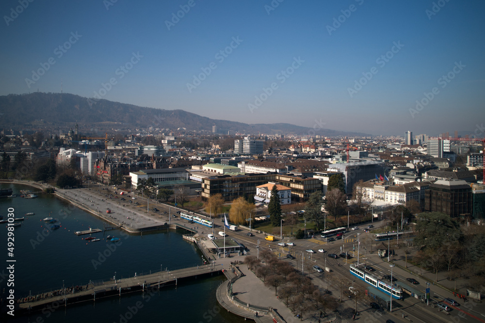Aerial view of City of Zürich with lake Zürich, waterfront and Bürkli Square on a sunny spring day. Photo taken March 4th, 2022, Zurich, Switzerland.