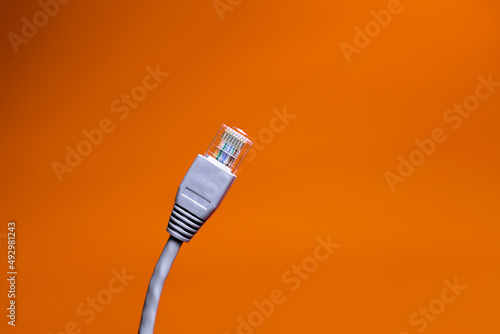 ethrnet cable on orange backround 