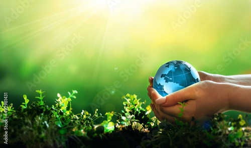 Earth Day. Environment day, save clean planet, ecology concept. Renewable energy-based green businesses can limit climate change and global warming. 