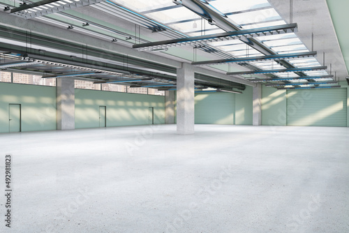 Simple spacious concrete warehouse garage interior. Space and design concept. 3D Rendering.