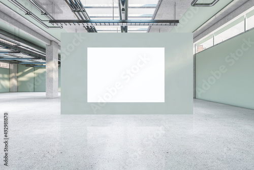 Contemporary spacious concrete warehouse garage interior with empty white mock up poster. Space and design concept. 3D Rendering.